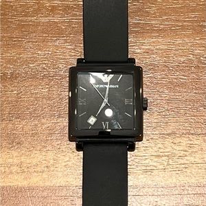 Emporio Armani men’s watch. Adjustable. No box. May need new watch battery.